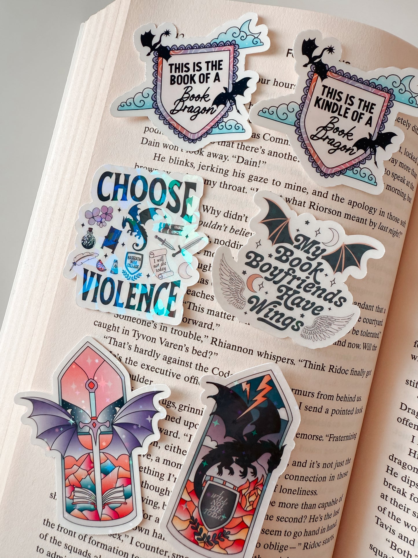 The Book/Kindle of a Book Dragon Glossy Vinyl Sticker